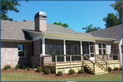 Gutters protecting deck from roof runnoff