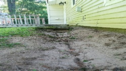 Eroded soil due to lack of gutters